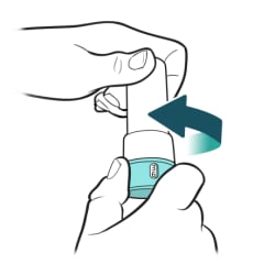 One hand holding bottom of inhaler while other hand twists cap clockwise to close.