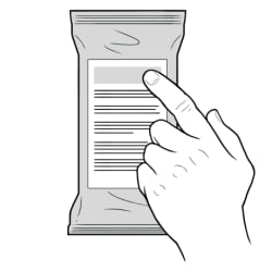 Hand pointing to directions on back of CHG wipes in package.