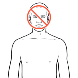 Close up of person with prohibition symbol on face and head.