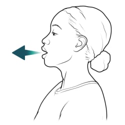 Person breathing out through mouth.