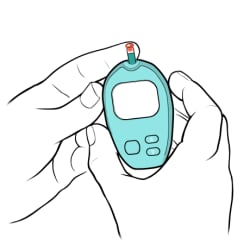 One hand holding glucometer to finger of other hand, with drop of blood on finger tip.