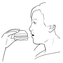 Person eating a sandwich.