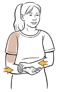 Woman doing internal rotation shoulder exercise.