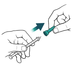 One hand holding syringe and other hand removing cap from needle on syringe.