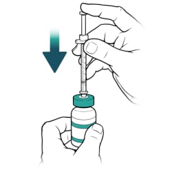 Hand pushing plunger to push needle down into insulin bottle.