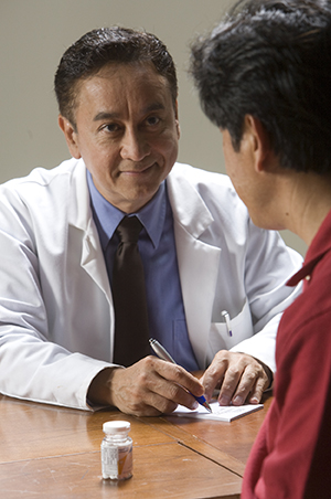 Patient talking to doctor.