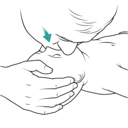 Person giving rescue breath to baby, with person's mouth over baby’s mouth and nose and a hand on baby’s head.